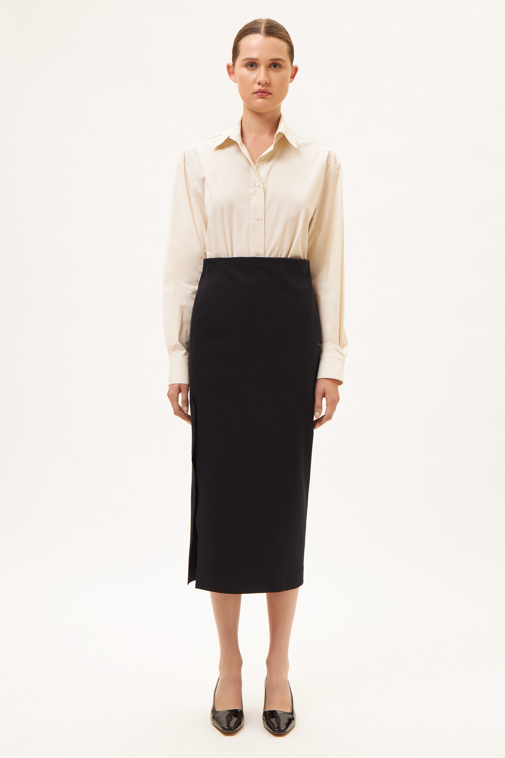 AOS Εφαρμοστή μαύρη μίντι φούστα