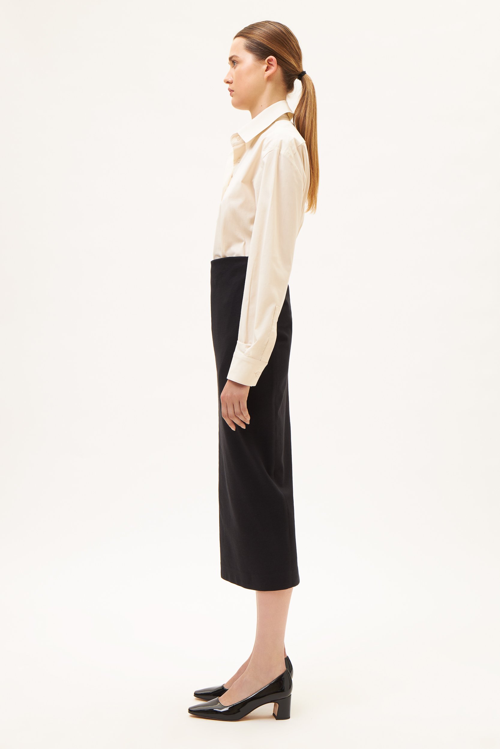 AOS Εφαρμοστή μαύρη μίντι φούστα